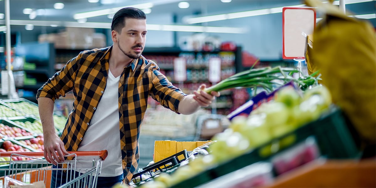 loading groceries into a shopping cart